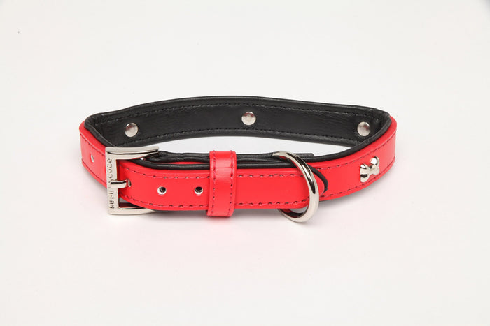 Rufus and Coco classic stud dog collar gives your dog a chic look at an affordable price. Available in leather look in 4 colours - beige, black, red and pink. The adjustable dog collar comes with silver bone shaped studs, sturdy D ring to attach your lead, and silver signature logo buckle.